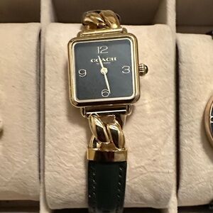 Coach Women's Watch with Gold Case and Black Strap
